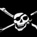 White pirate skull and crossbones symbol on a black background