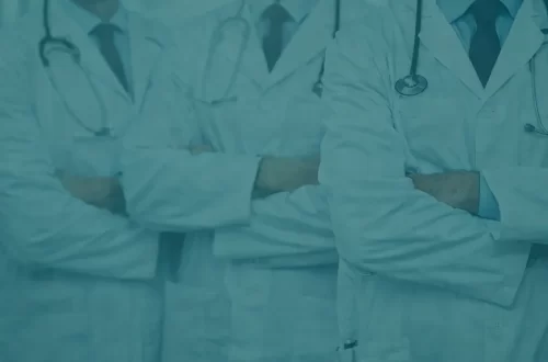 Doctors in lab coats standing together, representing institutional authority and the question of whether experts can always be trusted